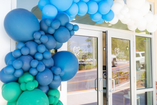Front entrance with grand opening balloons